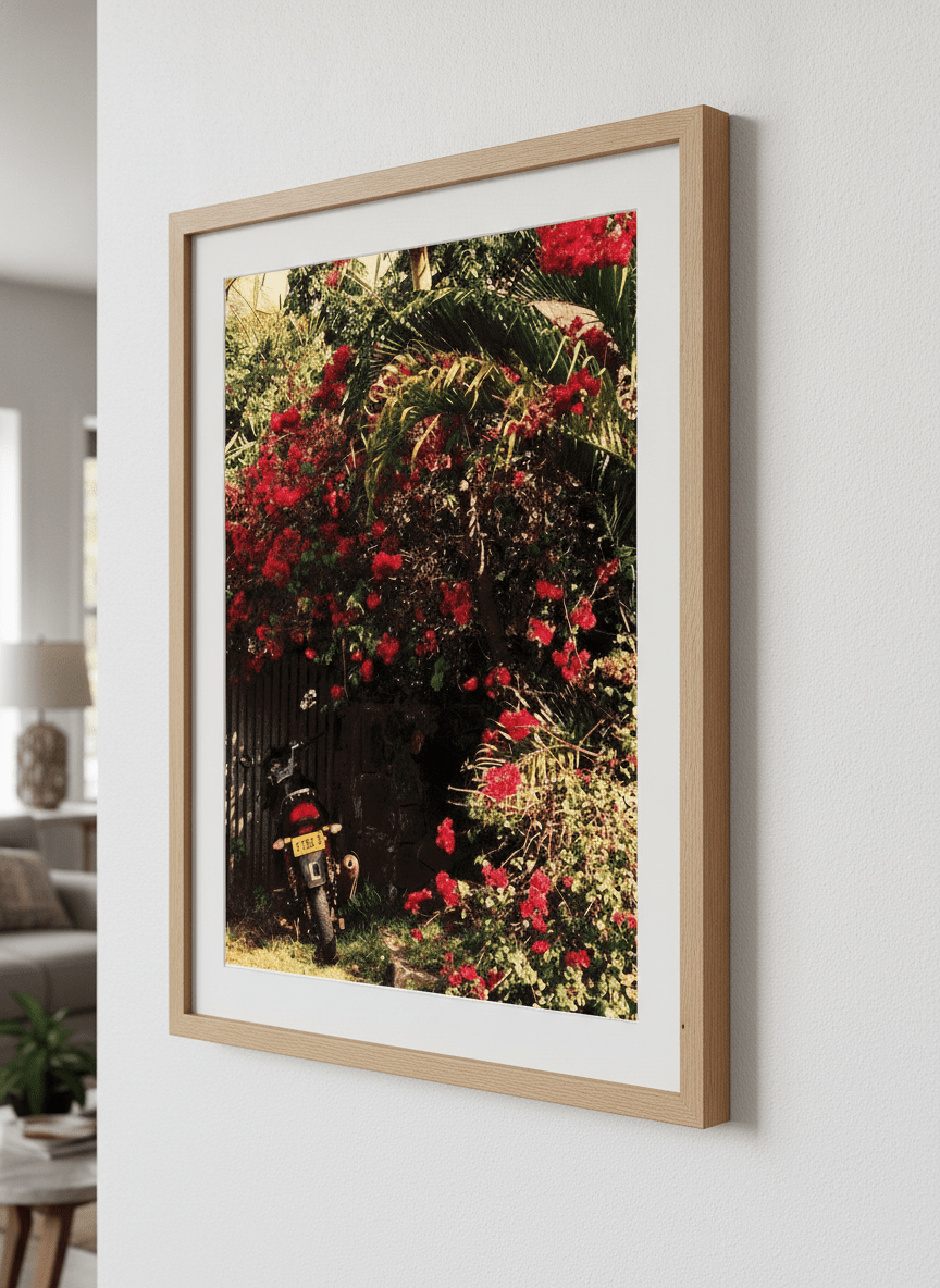 Modern wall art styled above a sofa in a neutral living room