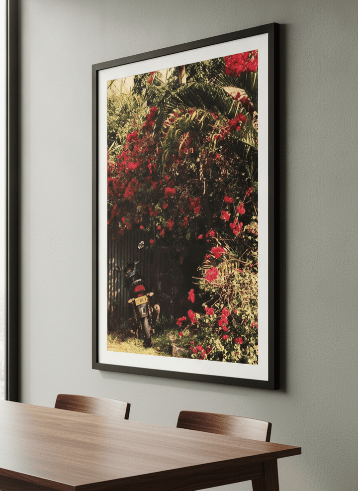 Wall art styled above a dining table in a contemporary home