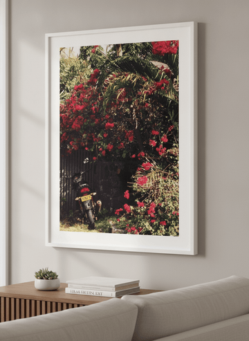 Modern wall art styled above a sofa in a neutral living room