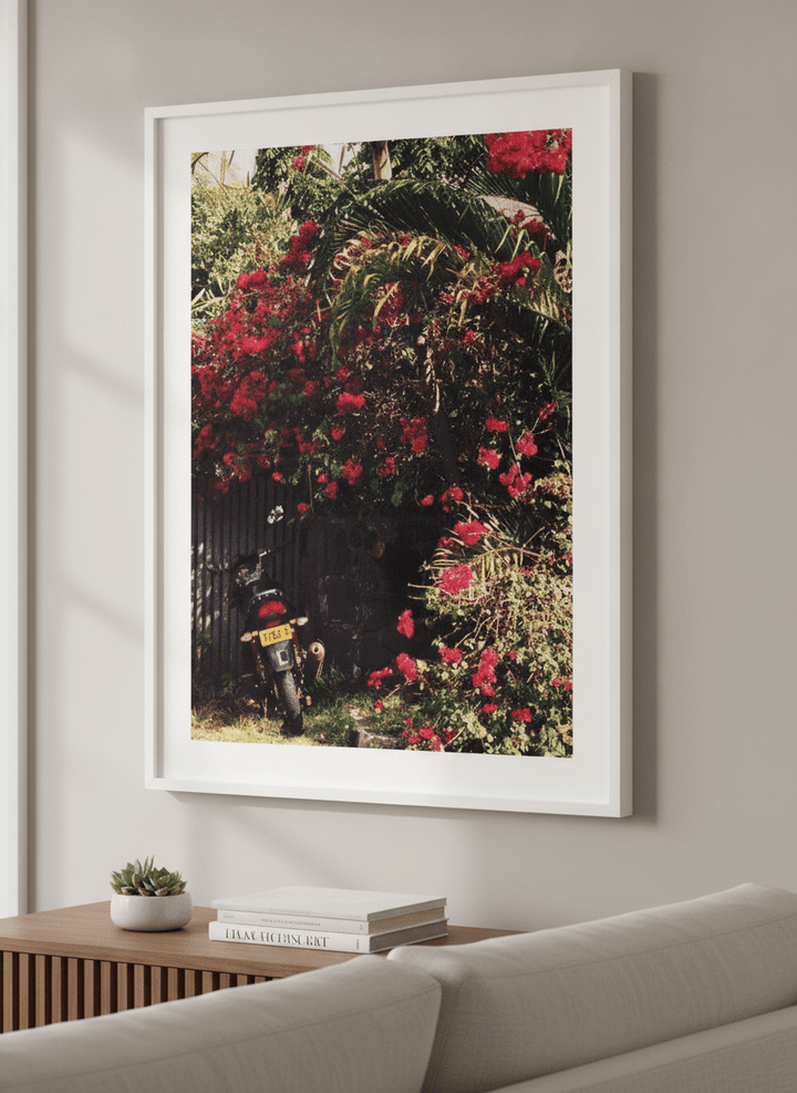 Modern wall art styled above a sofa in a neutral living room