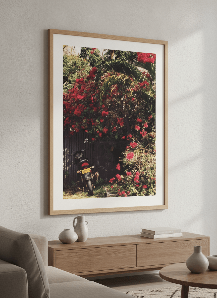 Modern wall art styled above a sofa in a neutral living room