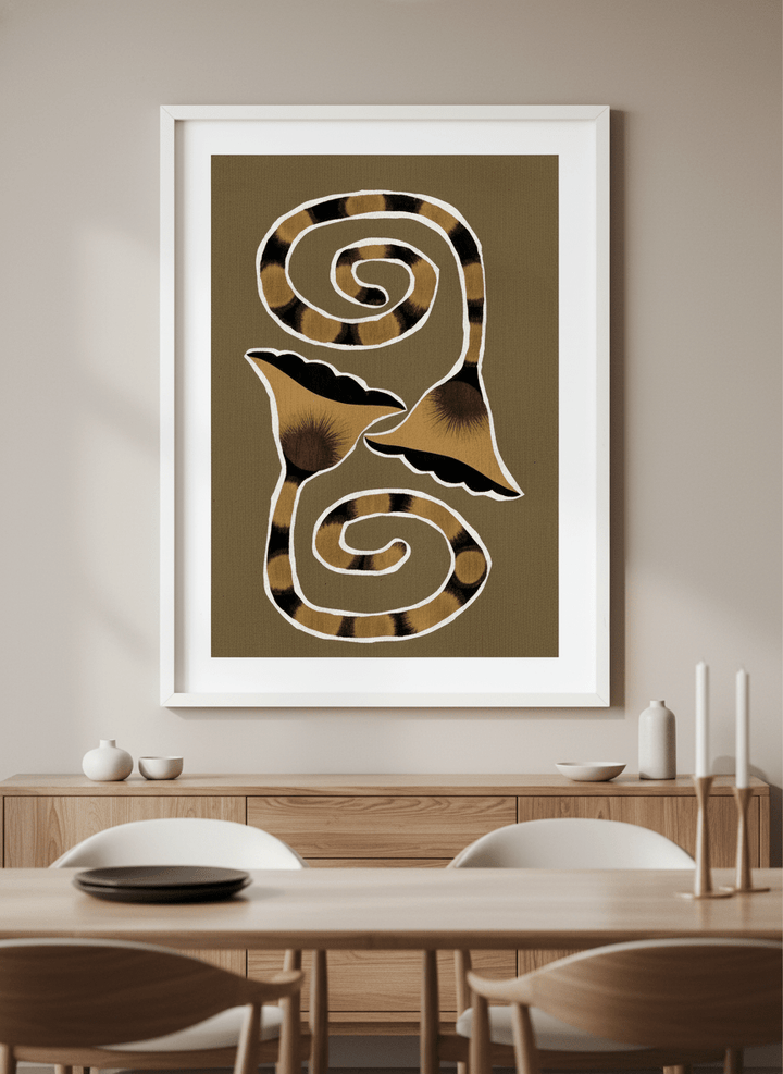 Wall art styled above a dining table in a contemporary home