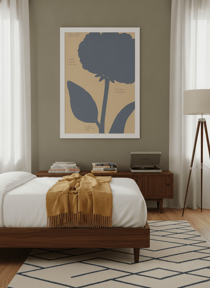 Modern wall art print styled on the wall in a mid-century bedroom