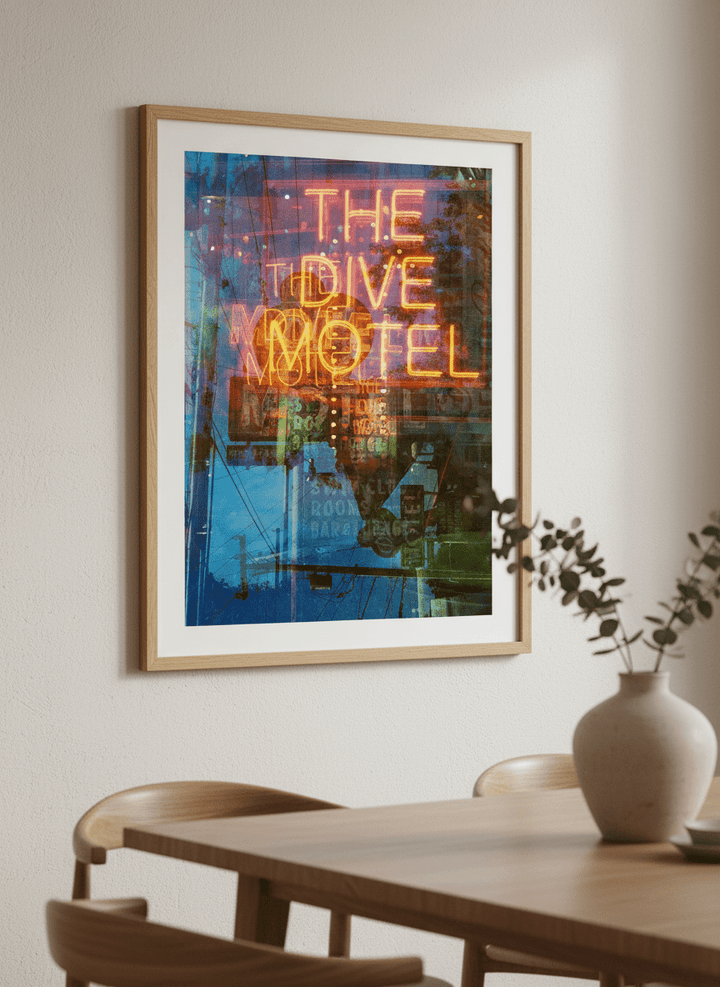 Wall art styled above a dining table in a contemporary home