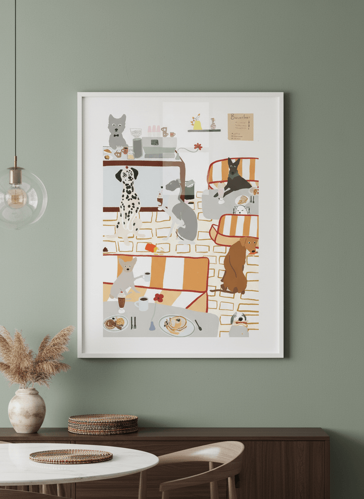 Wall art styled above a dining table in a contemporary home