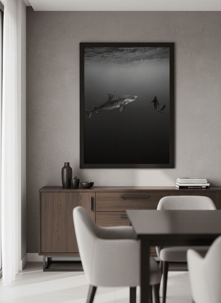 Wall art styled above a dining table in a contemporary home