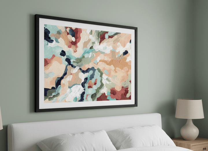 Minimalist artwork displayed in a calm, light-filled bedroom interior