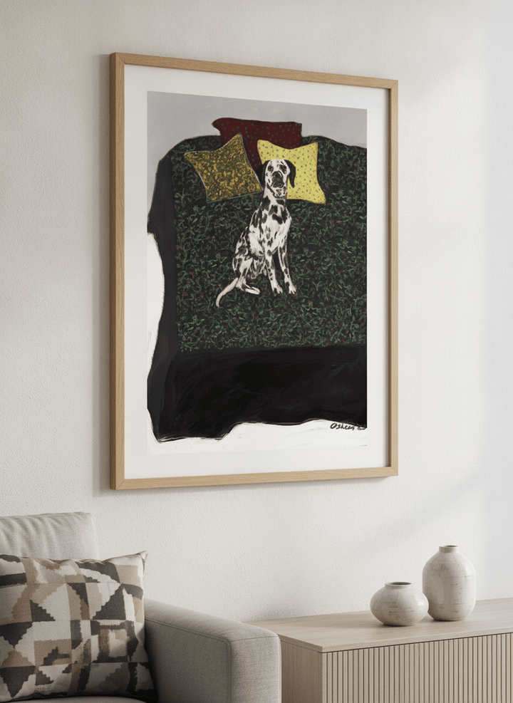 Modern wall art styled above a sofa in a neutral living room
