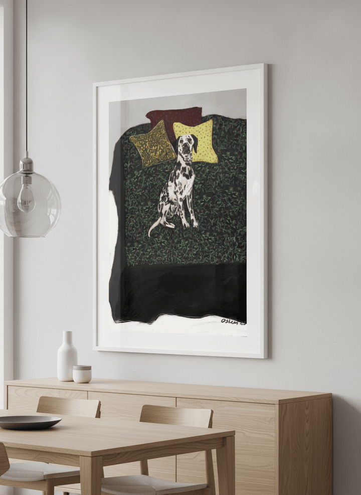 Wall art styled above a dining table in a contemporary home