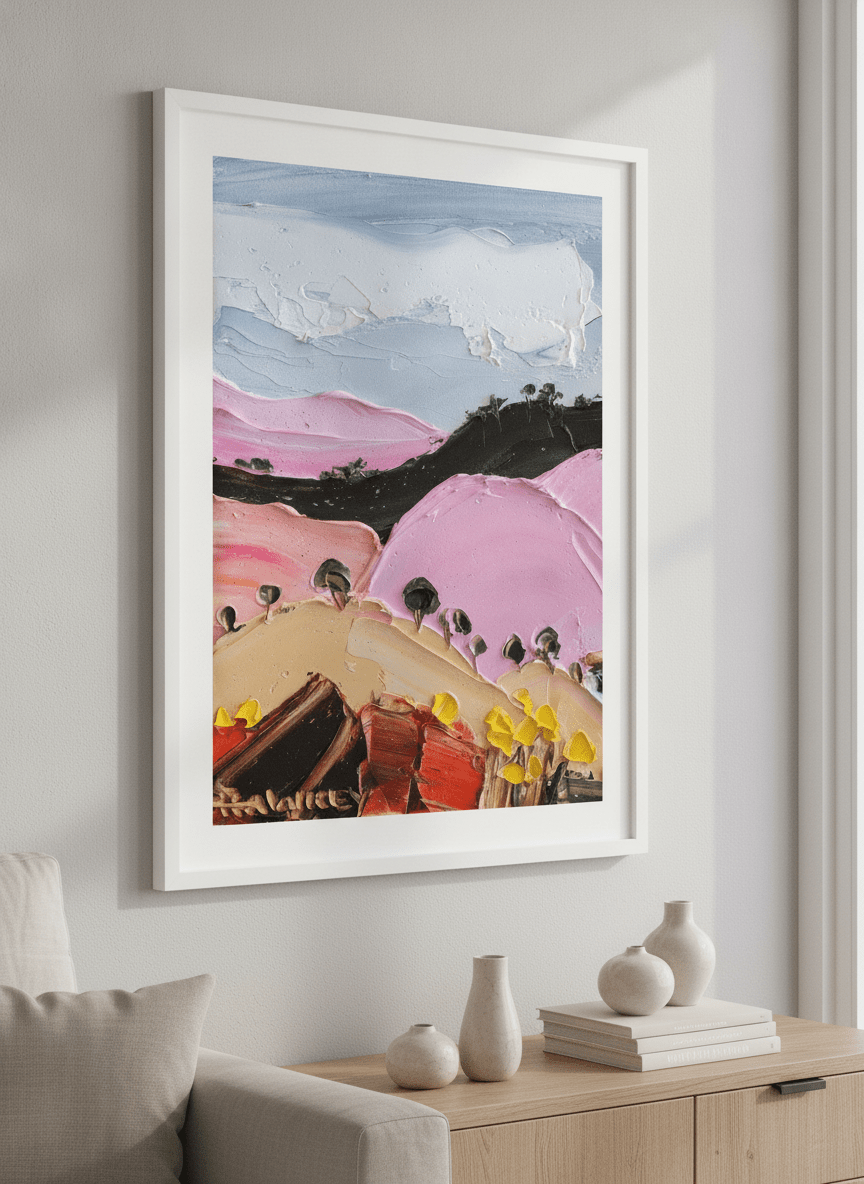 Modern wall art styled above a sofa in a neutral living room