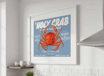 Artwork styled on the wall of a bright modern kitchen