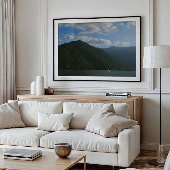 white sofa on living room with printed photo on wall