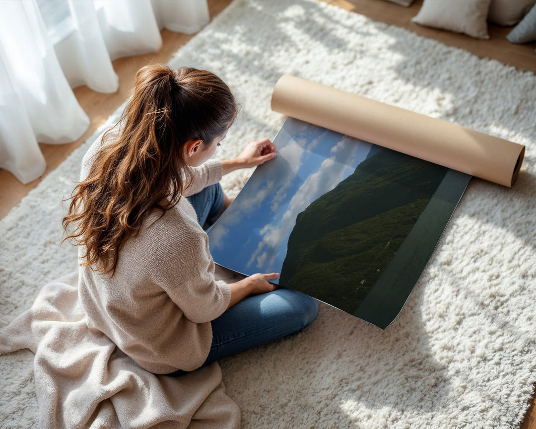 unrolling printed photo on rug