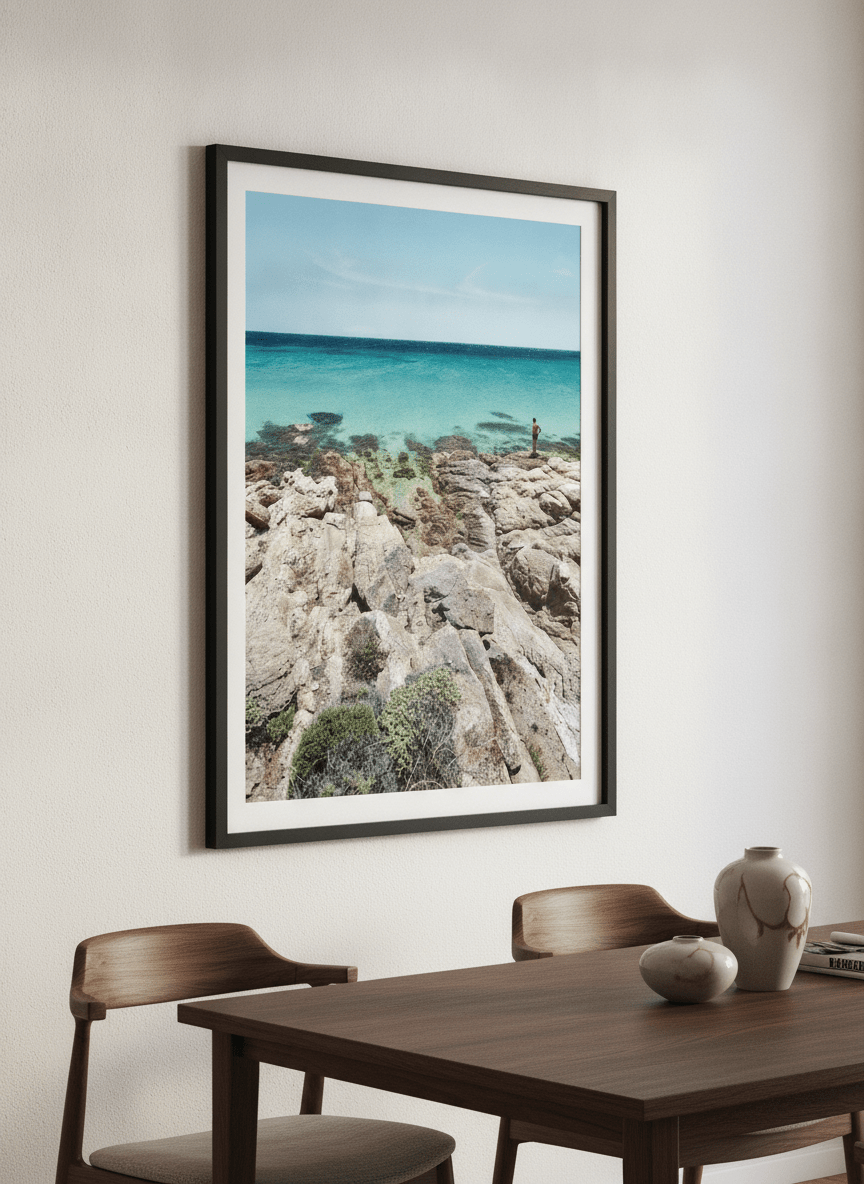 Wall art styled above a dining table in a contemporary home
