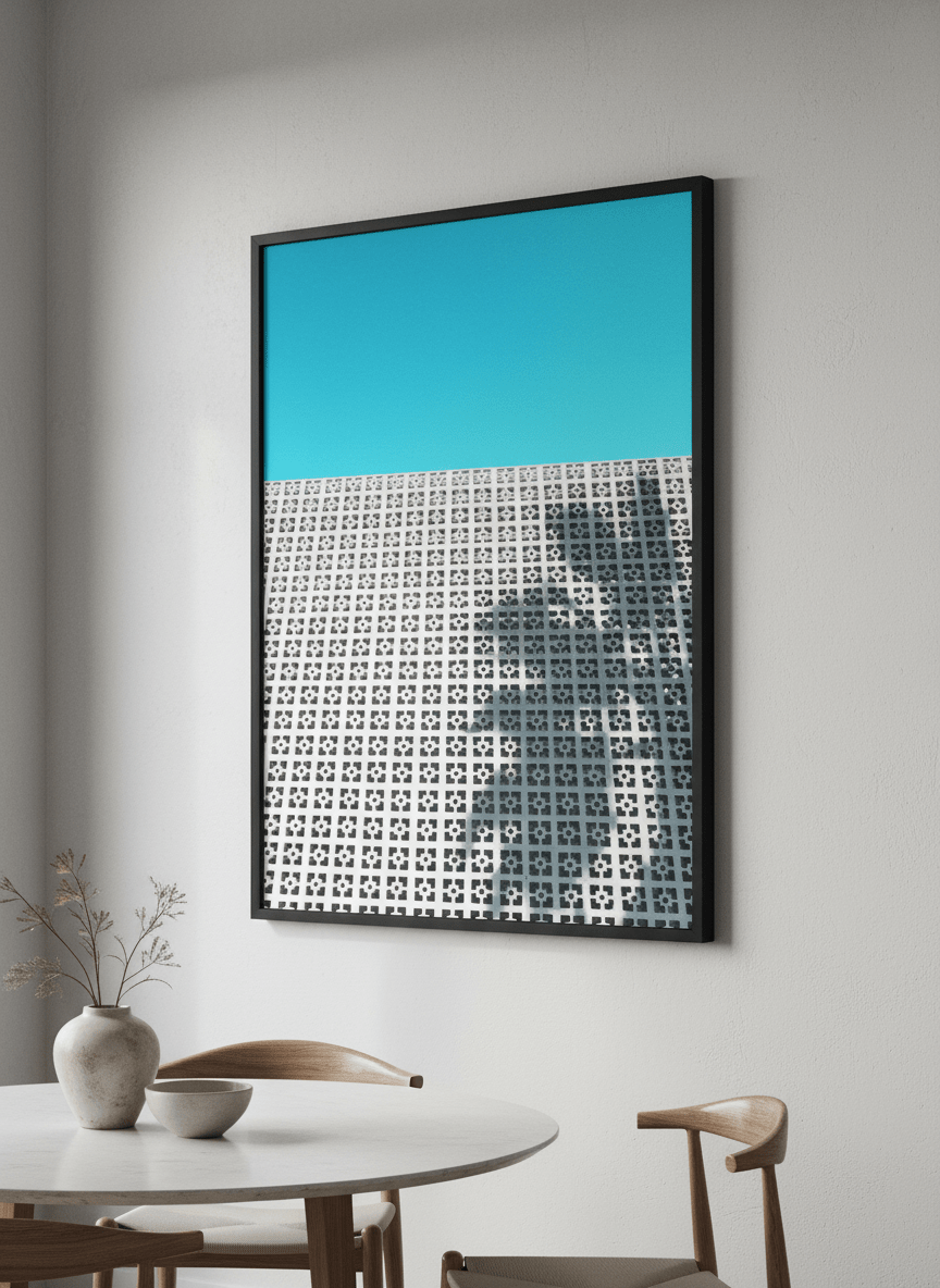 Wall art styled above a dining table in a contemporary home