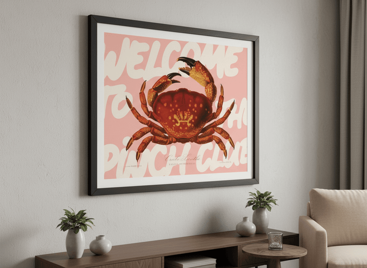 Modern wall art styled above a sofa in a neutral living room