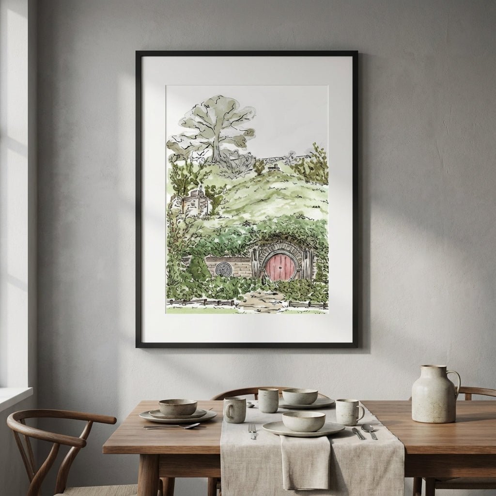 artwork of a hobbit house in a green landscape on a wall above a dining table.