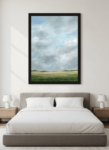 Minimalist artwork displayed in a calm, light-filled bedroom interior