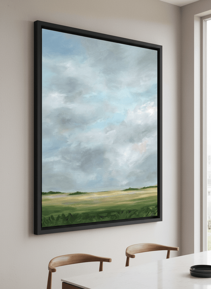 Wall art styled above a dining table in a contemporary home