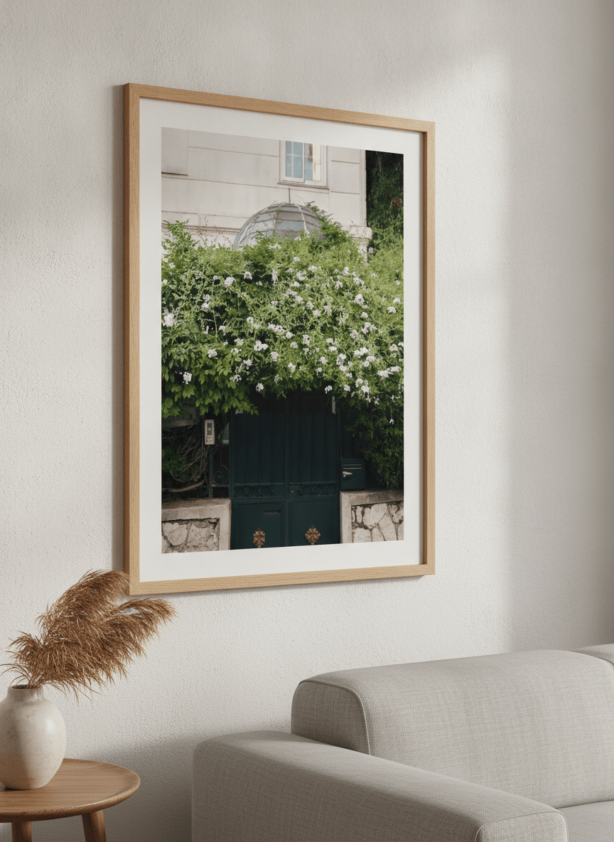 Modern wall art styled above a sofa in a neutral living room