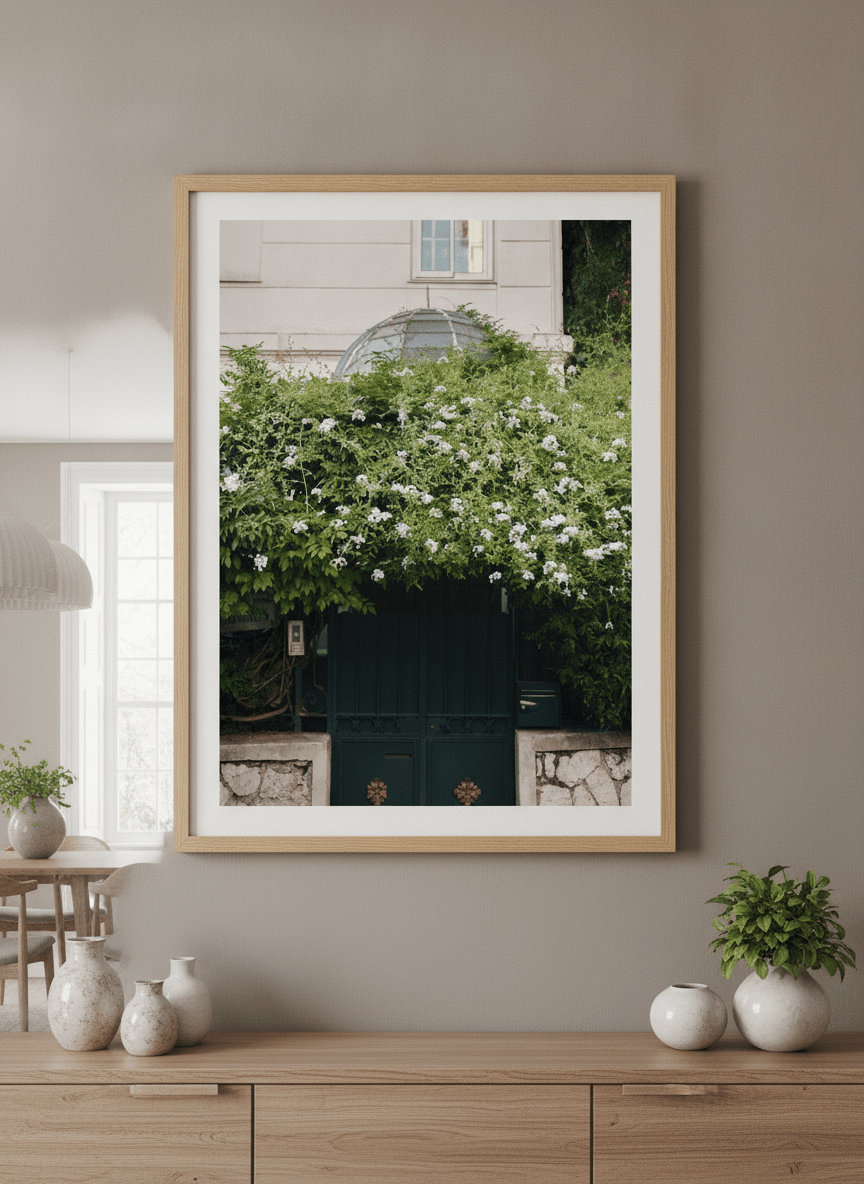 Wall art styled above a dining table in a contemporary home
