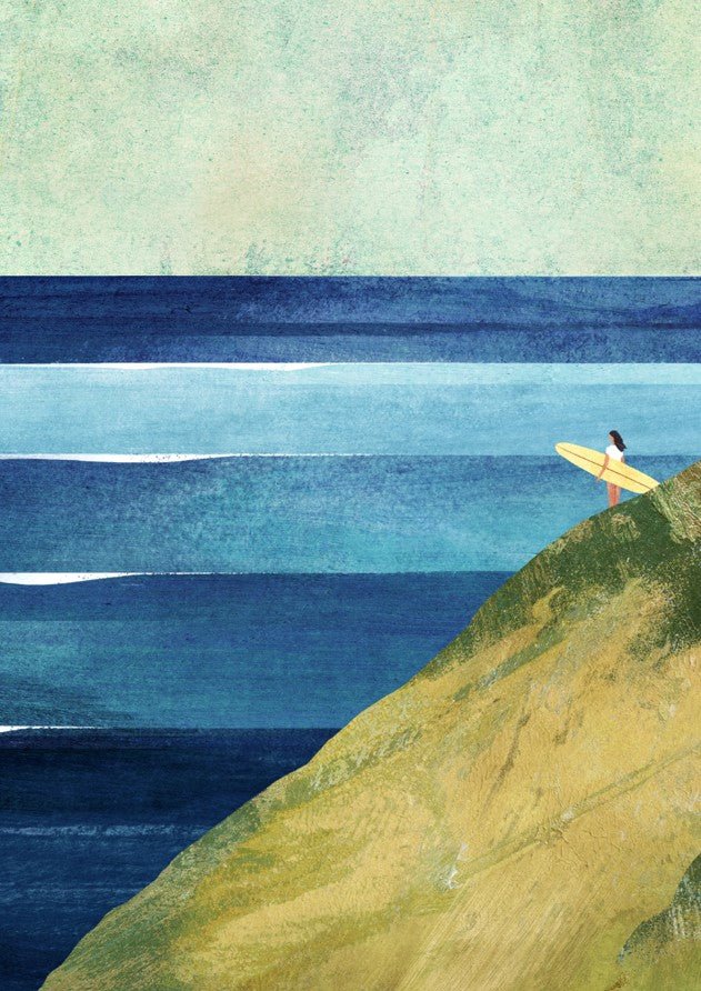 Person with a surfboard standing on a cliff overlooking a blue ocean. framed