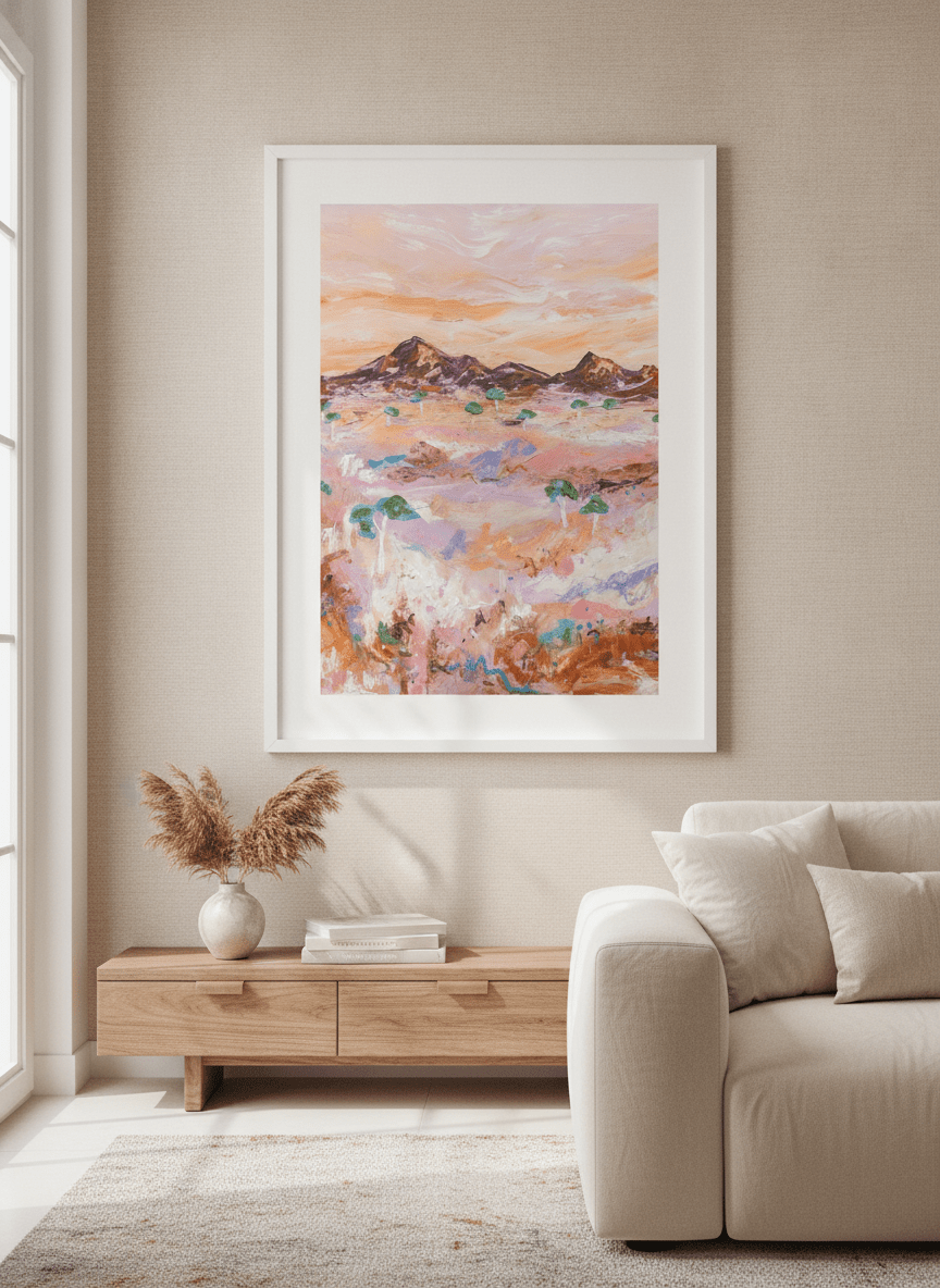 Modern wall art styled above a sofa in a neutral living room