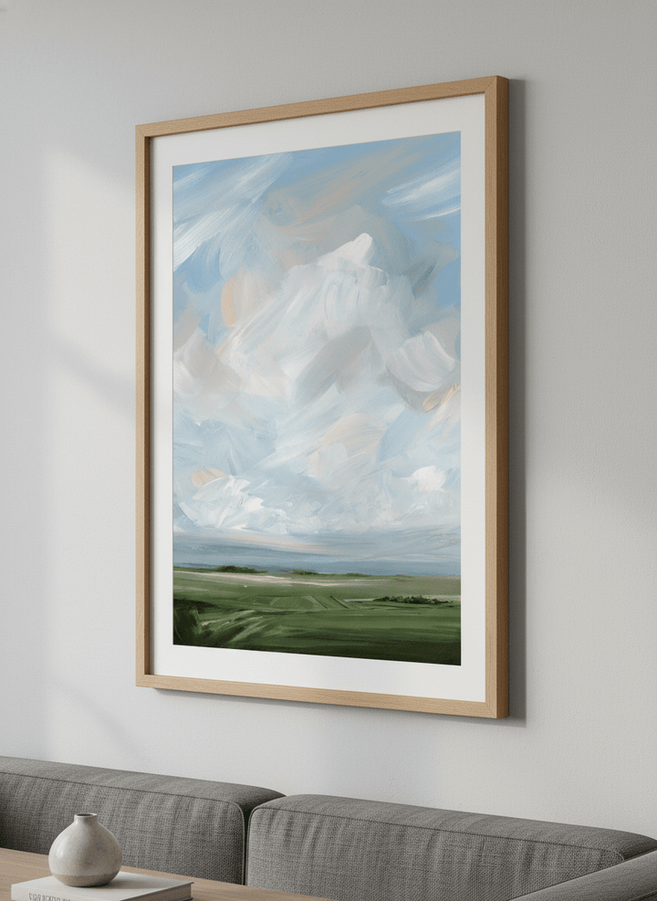 Modern wall art styled above a sofa in a neutral living room