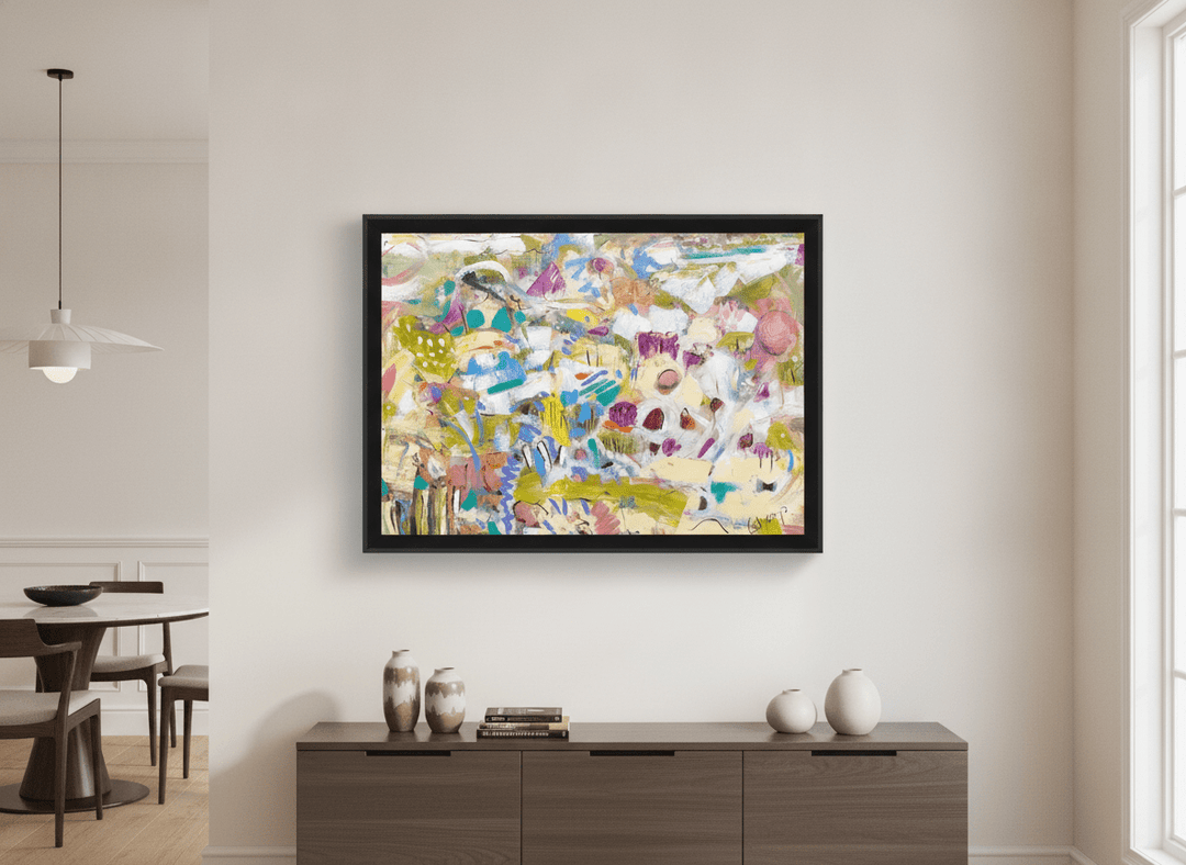 Wall art styled above a dining table in a contemporary home