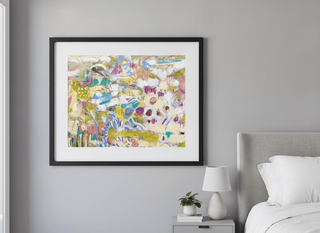 Minimalist artwork displayed in a calm, light-filled bedroom interior