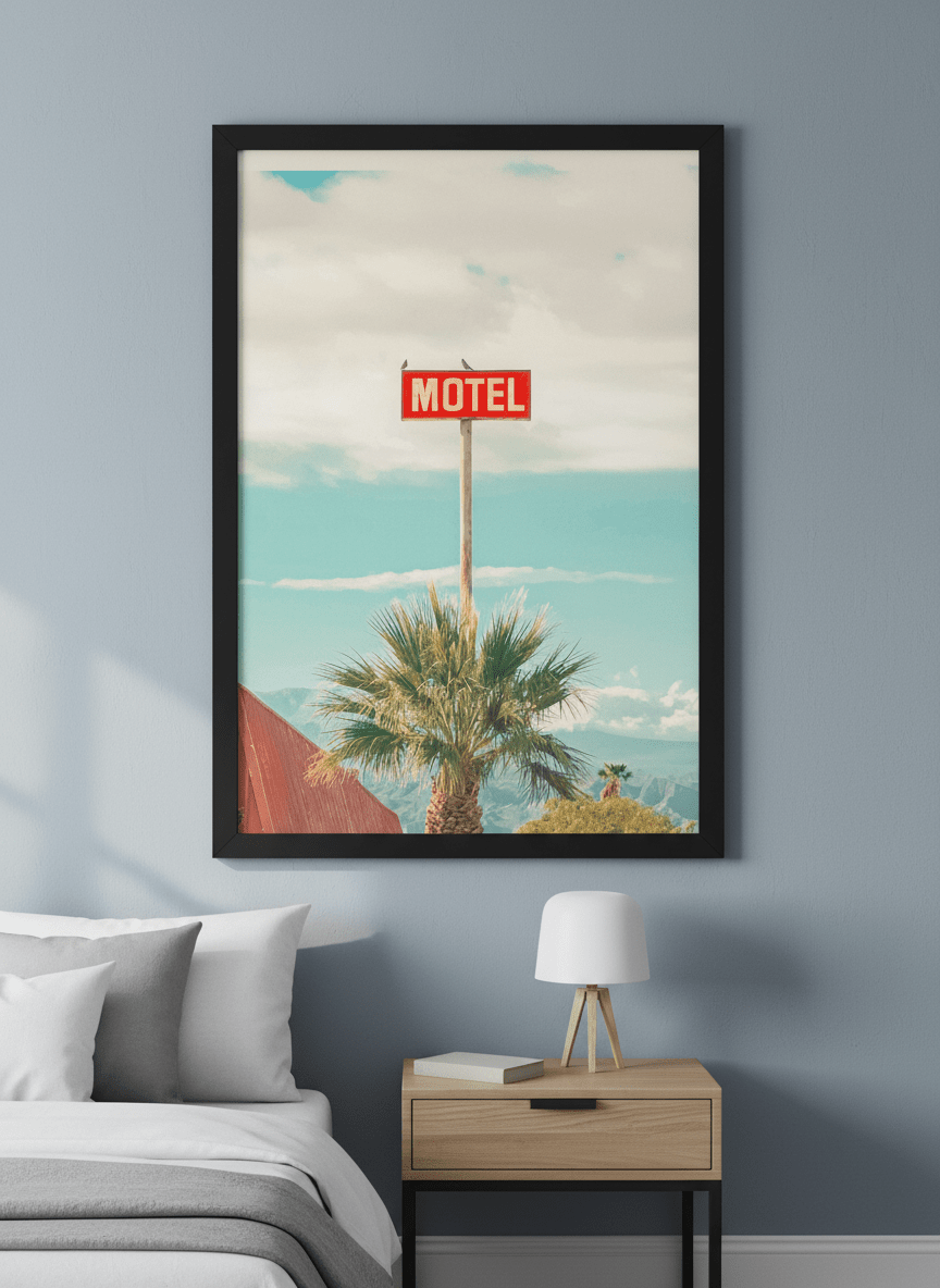 Minimalist artwork displayed in a calm, light-filled bedroom interior