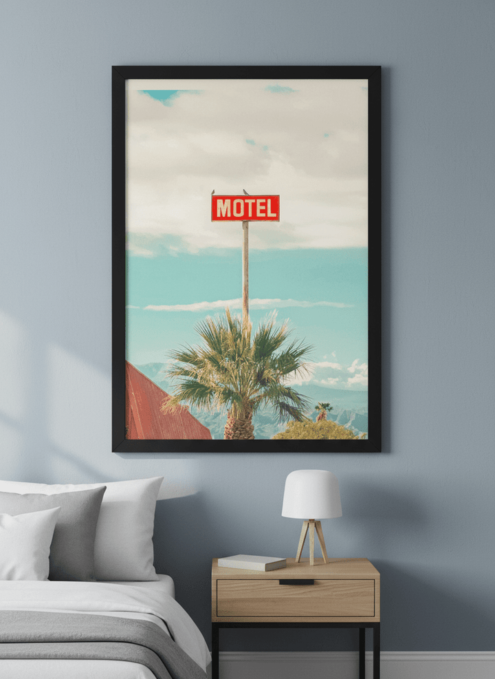 Minimalist artwork displayed in a calm, light-filled bedroom interior