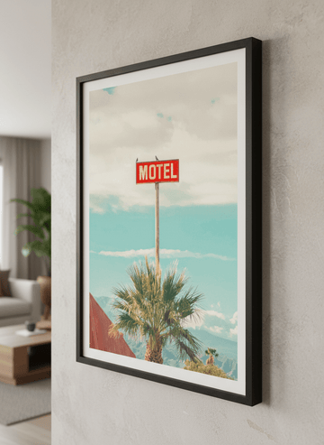 Modern wall art styled above a sofa in a neutral living room