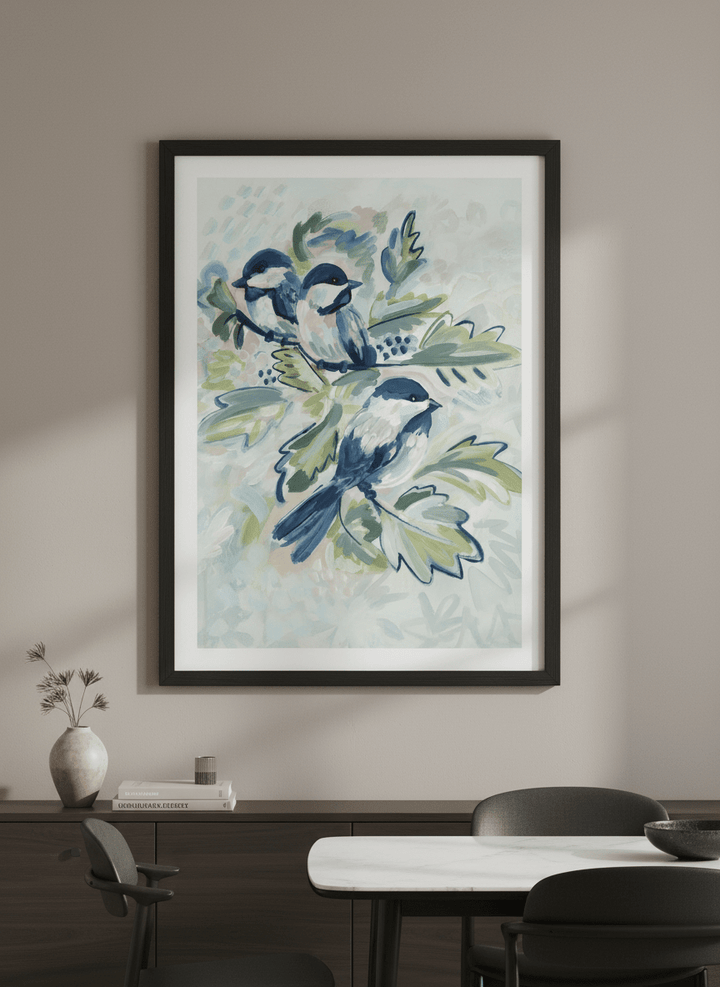 Wall art styled above a dining table in a contemporary home