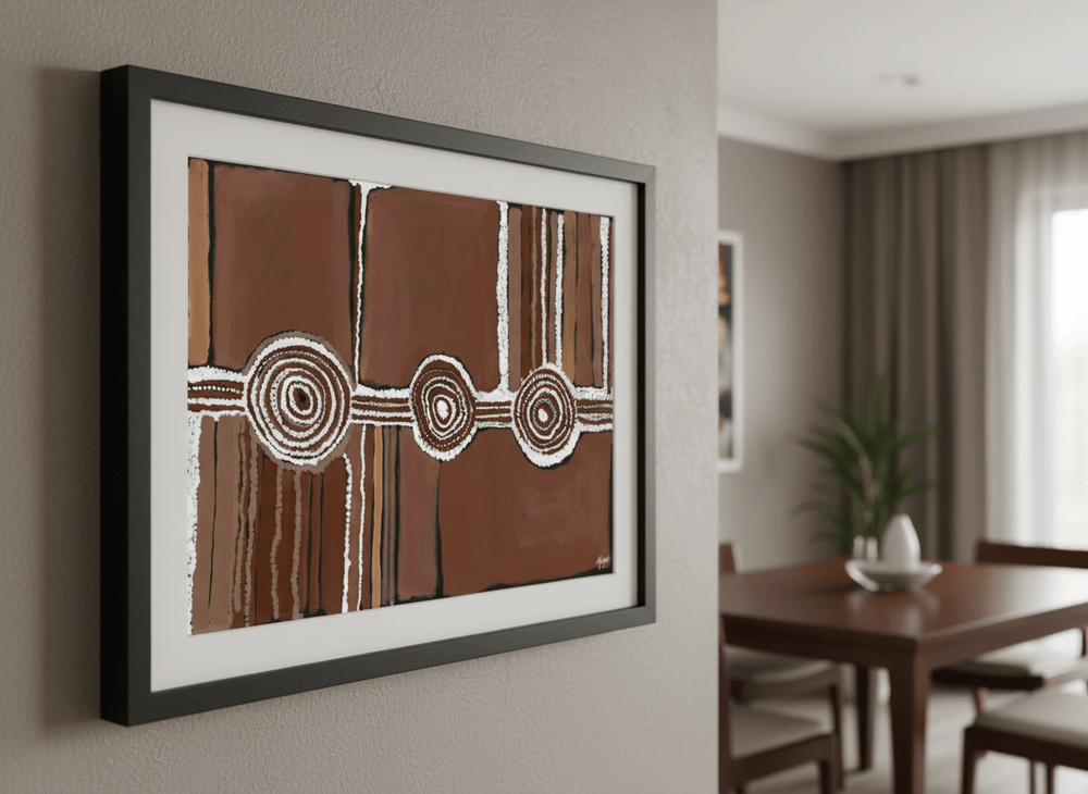 Wall art styled above a dining table in a contemporary home