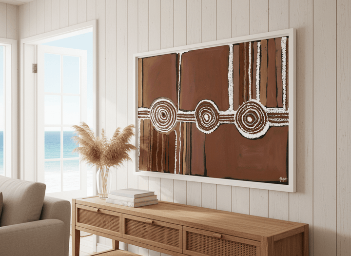 Neutral wall art displayed in a sunny coastal beach house