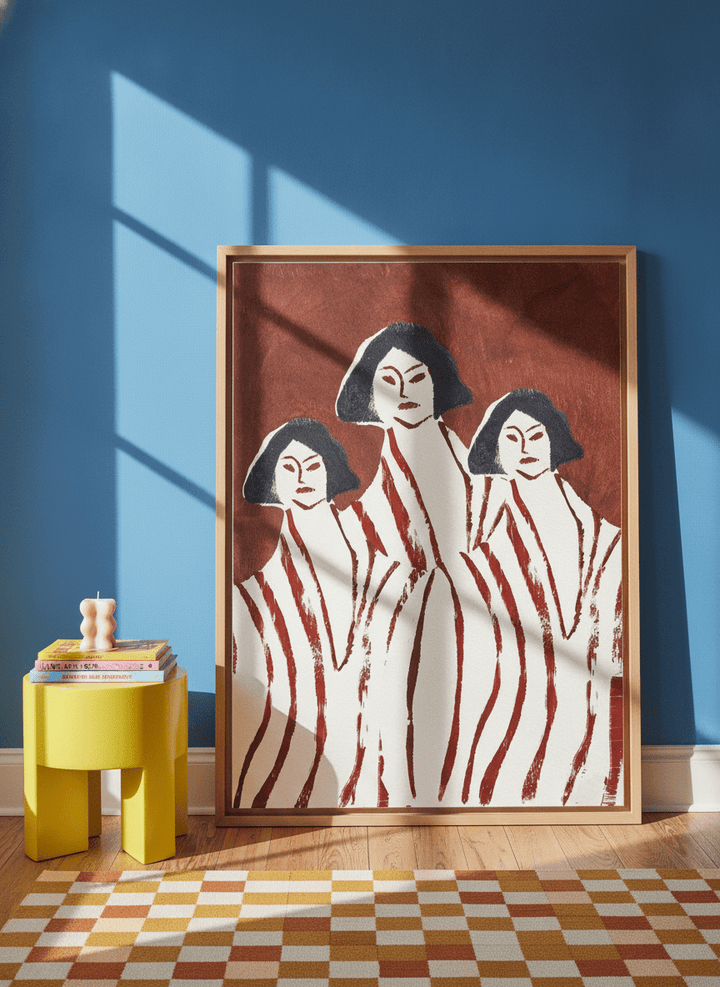Oversized statement canvas wall art with a natural timber surround leaning against the wall in a colourful eclectic living room
