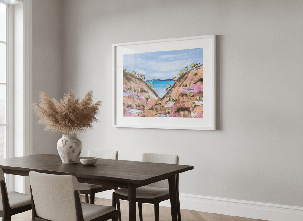 Wall art styled above a dining table in a contemporary home