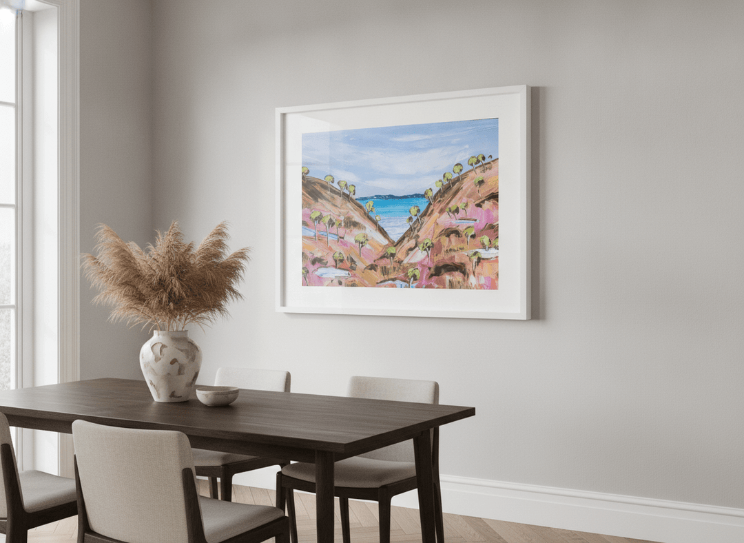Wall art styled above a dining table in a contemporary home
