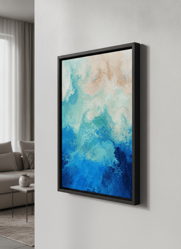 Modern wall art styled above a sofa in a neutral living room