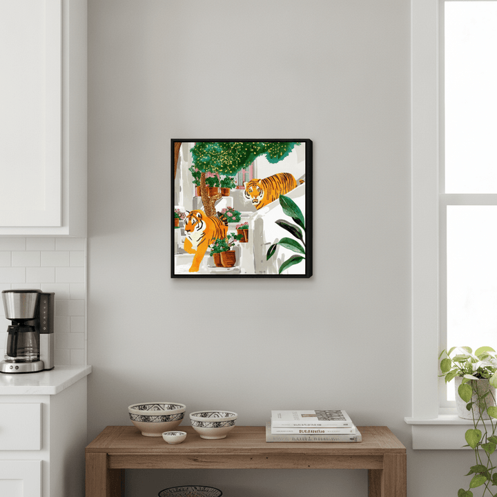 Canvas wall art with a black surround styled in a bright modern kitchen