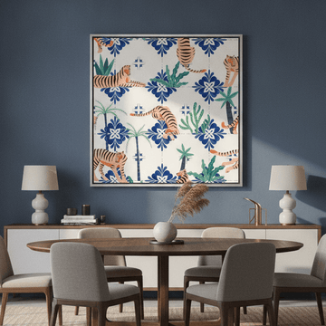 Oversized statement canvas wall art with a silver leaf surround styled in a contemporary dining room