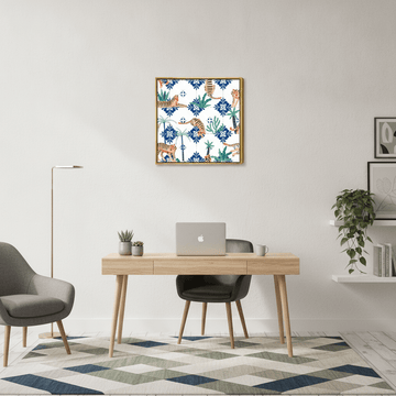 Canvas wall art with a gold leaf surround styled in a bright modern office