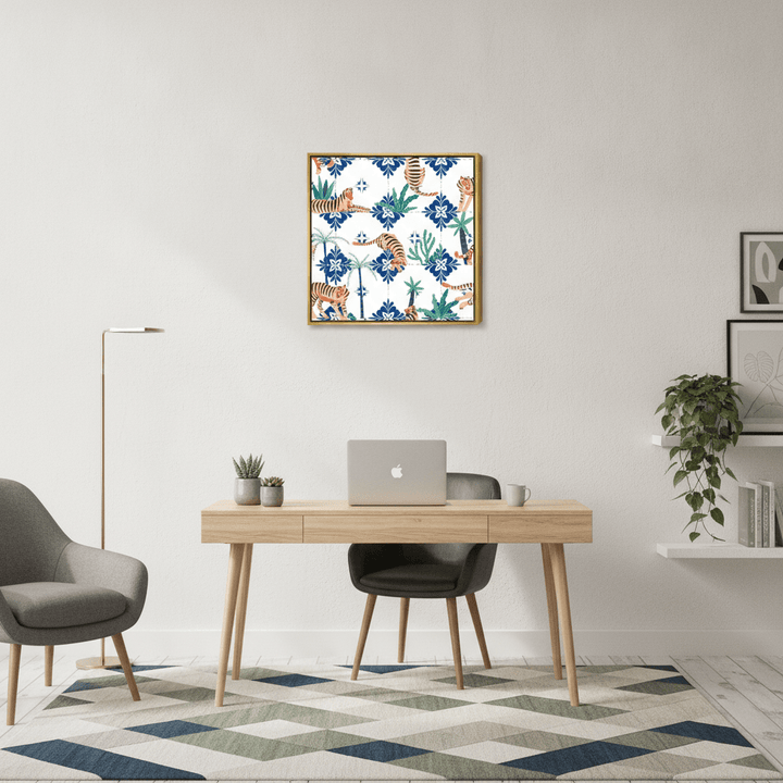Canvas wall art with a gold leaf surround styled in a bright modern office