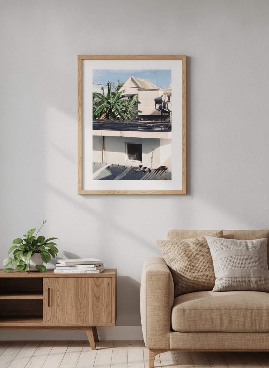 Artwork displayed above a credenza in a real-looking contemporary home