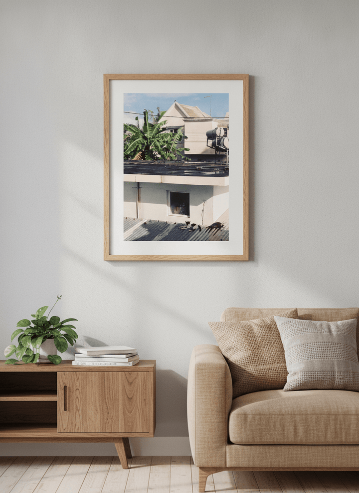 Artwork displayed above a credenza in a real-looking contemporary home