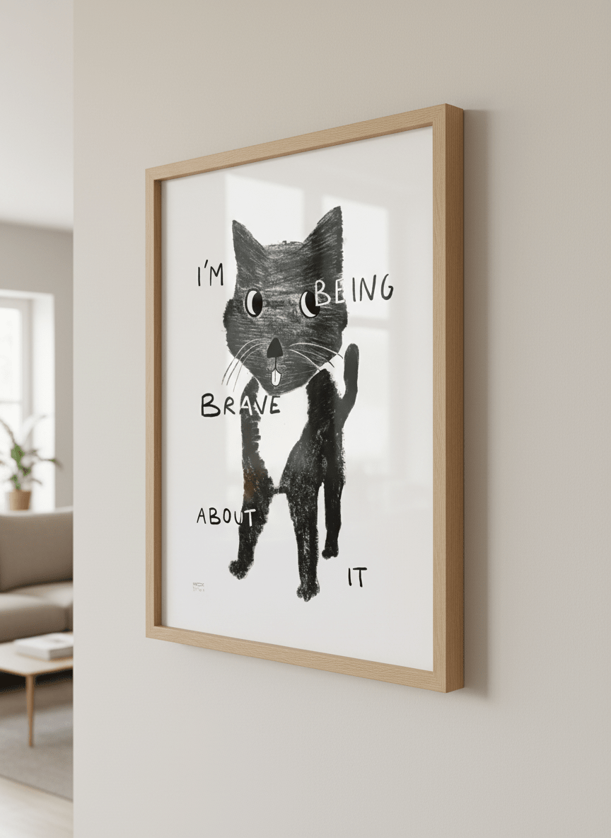 Modern wall art styled above a sofa in a neutral living room