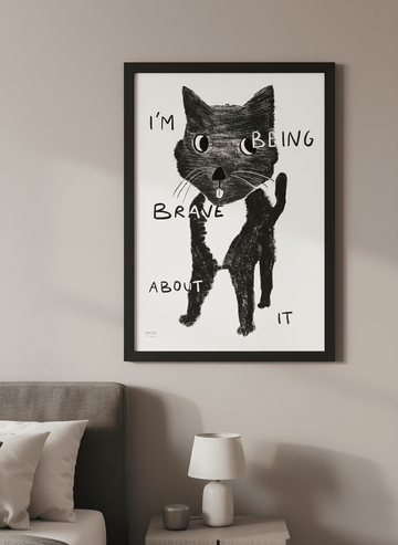 Minimalist artwork displayed in a calm, light-filled bedroom interior