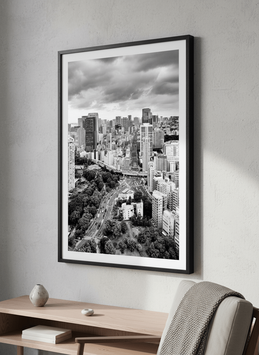 Modern wall art styled above a sofa in a neutral living room