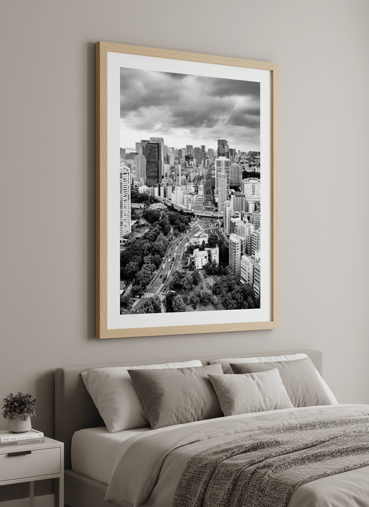 Minimalist artwork displayed in a calm, light-filled bedroom interior